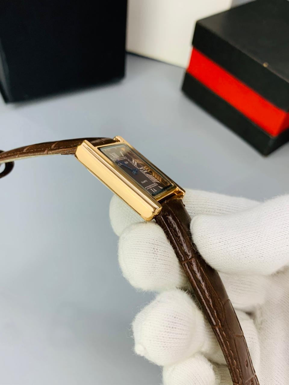 CT  BROWN DIAL BROWN STRAP