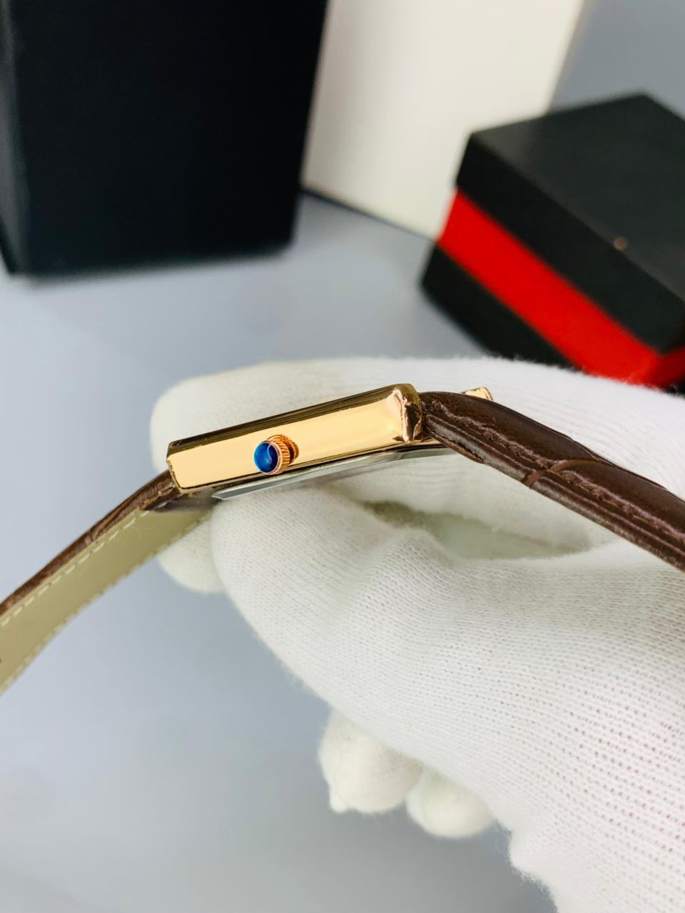 CT  BROWN DIAL BROWN STRAP