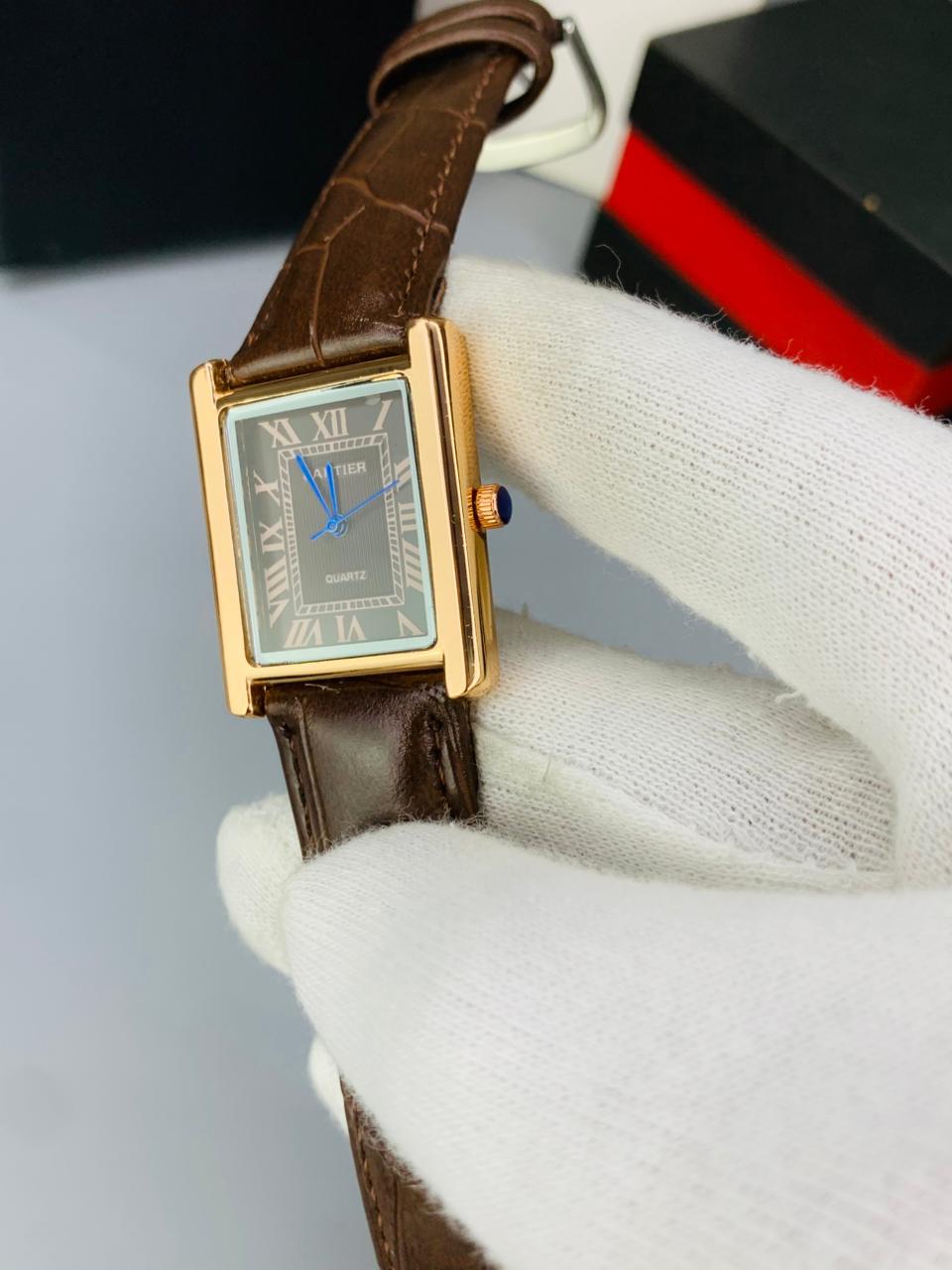 CT  BROWN DIAL BROWN STRAP