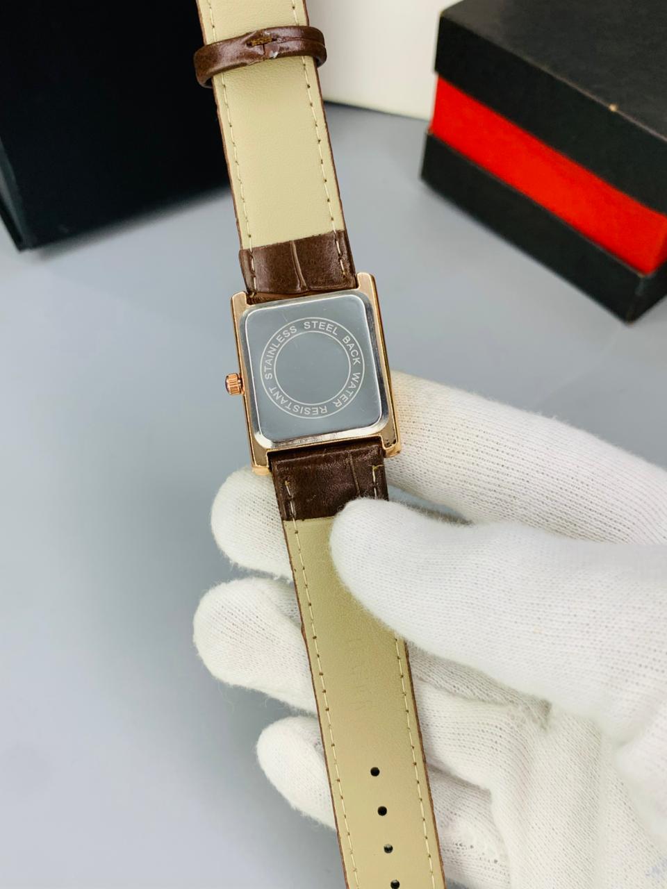 CT  BROWN DIAL BROWN STRAP